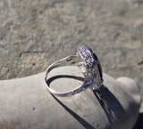 14k white gold c.1920's Art Deco garnet peacock filigree ring