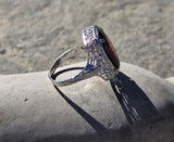 14k white gold c.1920's Art Deco garnet peacock filigree ring
