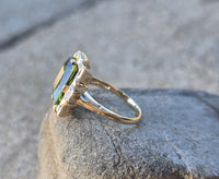 10k gold vintage emerald cut peridot ring