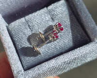 14k white gold Ruby scroll studs