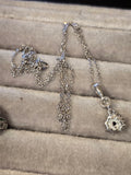 Platinum and 14k white gold pink diamond estate flower pendant necklace