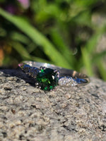 platinum tzavorite garnet and diamond estate ring
