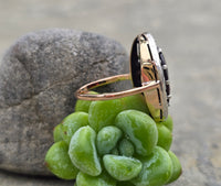 14k gold + silver top Edwardian diamond and garnet halo antique ring
