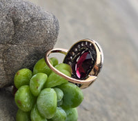 14k gold + silver top Edwardian diamond and garnet halo antique ring