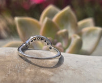14k white gold curved diamond estate band