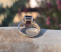14k gold emerald cut garnet and diamond estate ring