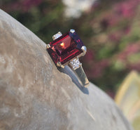 14k gold emerald cut garnet and diamond estate ring