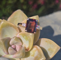 14k gold emerald cut garnet and diamond estate ring