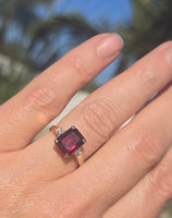 14k gold emerald cut garnet and diamond estate ring