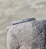 Platinum channel set diamond estate band
