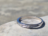 Platinum channel set diamond estate band
