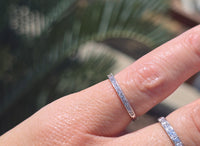 Platinum channel set diamond estate band