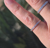 Platinum channel set diamond estate band
