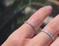 Platinum channel set diamond estate band