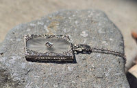 14k white gold Deco c.1920's etched camphor & diamond pendant necklace