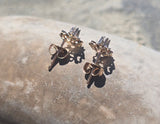 14k gold two tone diamond estate studs earrings - .09ct tw