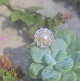 silver top and 10ct gold two tone pearl and old cut diamond antique halo ring