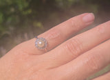 silver top and 10ct gold two tone pearl and old cut diamond antique halo ring