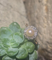 silver top and 10ct gold two tone pearl and old cut diamond antique halo ring