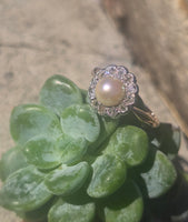 silver top and 10ct gold two tone pearl and old cut diamond antique halo ring