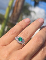 Platinum Art Deco emerald and diamond estate ring