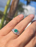 Platinum Art Deco emerald and diamond estate ring