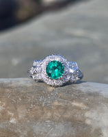 Platinum Art Deco emerald and diamond estate ring