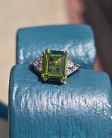 10k gold two tone emerald cut peridot and diamond estate ring
