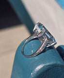 Platinum emerald cut aquamarine and diamond estate cocktail ring