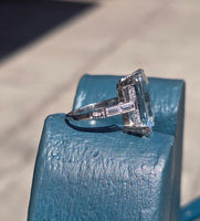 Platinum emerald cut aquamarine and diamond estate cocktail ring