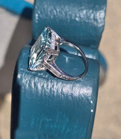 Platinum emerald cut aquamarine and diamond estate cocktail ring