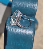 Platinum emerald cut aquamarine and diamond estate cocktail ring