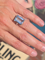 Platinum emerald cut aquamarine and diamond estate cocktail ring