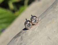 14k gold bezel set European cut diamond studs earrings - .36ct tw