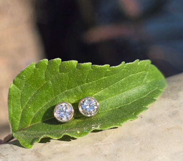 14k gold bezel set European cut diamond studs earrings - .36ct tw