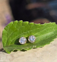 14k gold bezel set European cut diamond studs earrings - .36ct tw