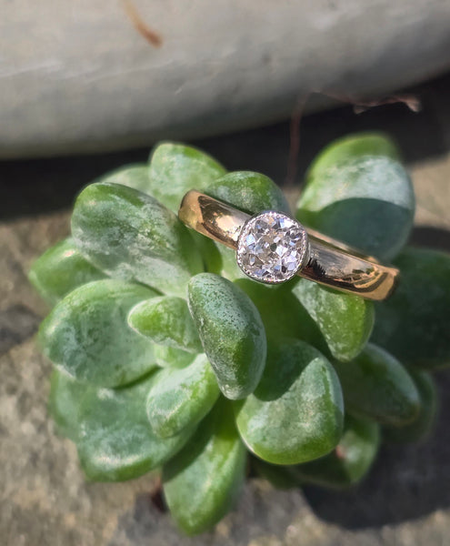 Platinum bezel and 18k gold mine cut diamond solitaire antique estate ring HOLD