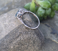 Platinum aquamarine and diamond antique ring