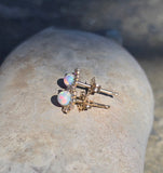 14k gold opal and diamond estate studs