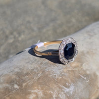 platinum & 14k gold blue sapphire and diamond halo antique ring