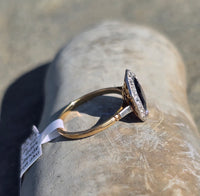 platinum & 14k gold blue sapphire and diamond halo antique ring