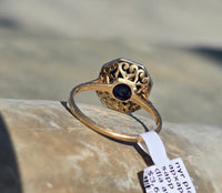 platinum & 14k gold blue sapphire and diamond halo antique ring