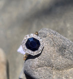 platinum & 14k gold blue sapphire and diamond halo antique ring