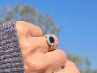 platinum & 14k gold blue sapphire and diamond halo antique ring