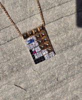 18k gold Bulgari Enigma diamond sapphire ruby lady face vintage pendant necklace