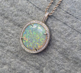 14k gold Australian opal and diamond reversible halo necklace pendant
