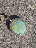14k gold Australian opal and diamond reversible halo necklace pendant