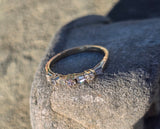 14k gold 2.2mm round and baguette diamond estate band