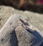 14k gold 2.2mm round and baguette diamond estate band