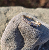 14k gold 2.2mm round and baguette diamond estate band